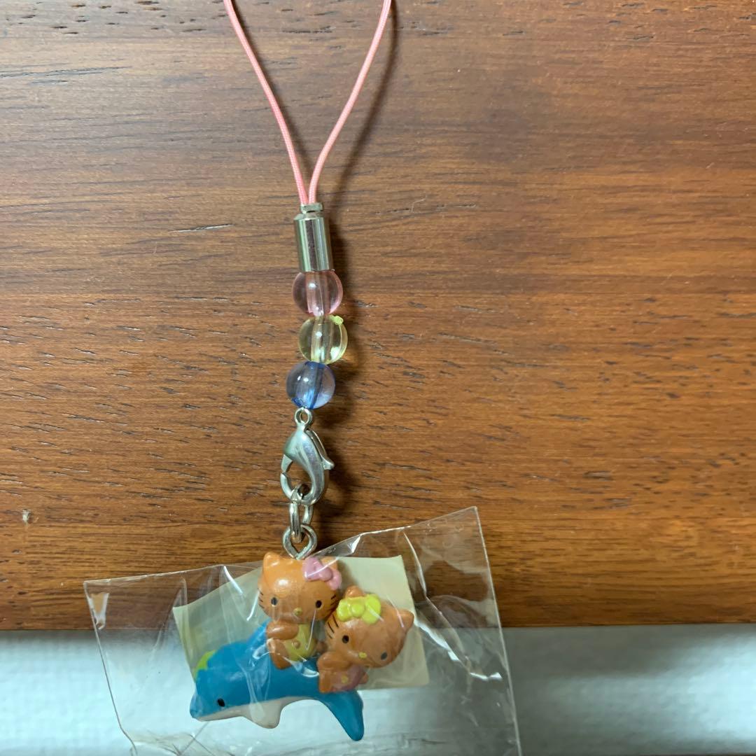 日焼けハローキティ キティ&ミミィ　ハローキティ イルカストラップ