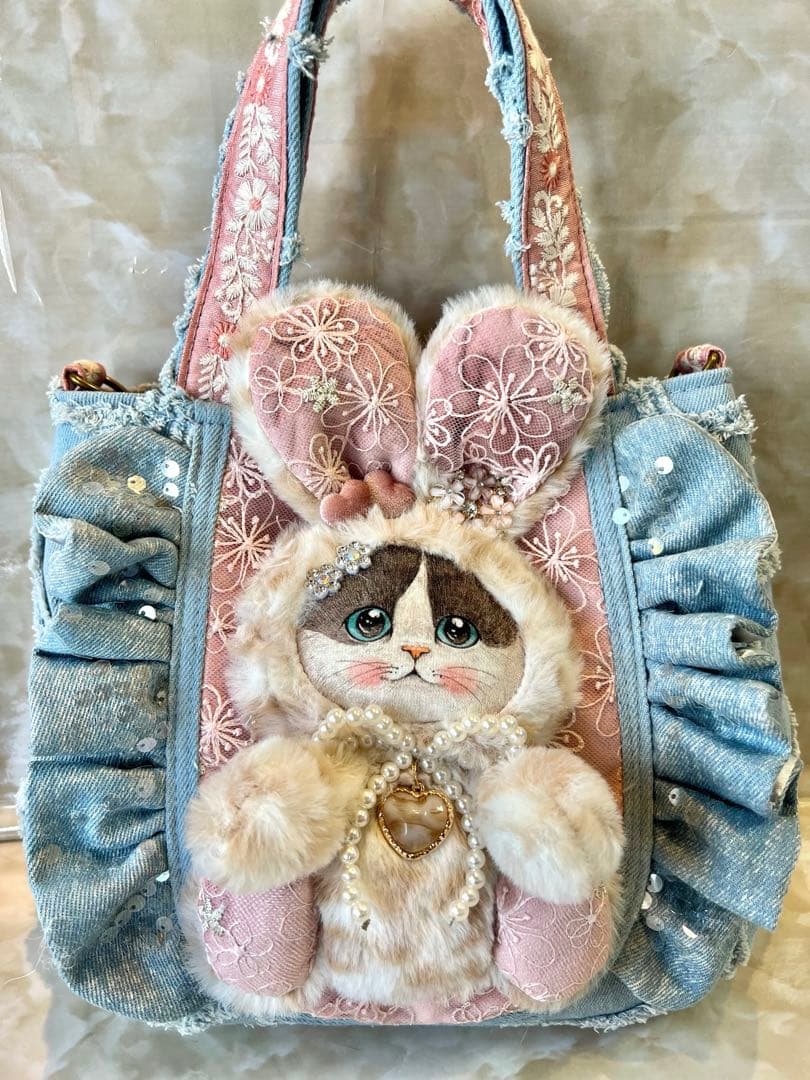 コヤンイサムチョン　ぽってり可愛い　ハートフリンジとフリルのデニムバッグ
