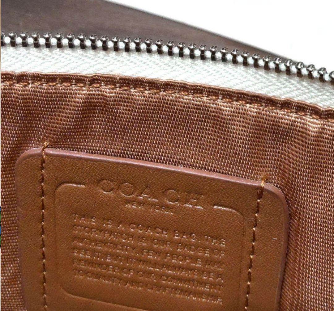 COACH コーチ ポーチ　リストレット　ダンボ　ディズニー　白　ホワイト