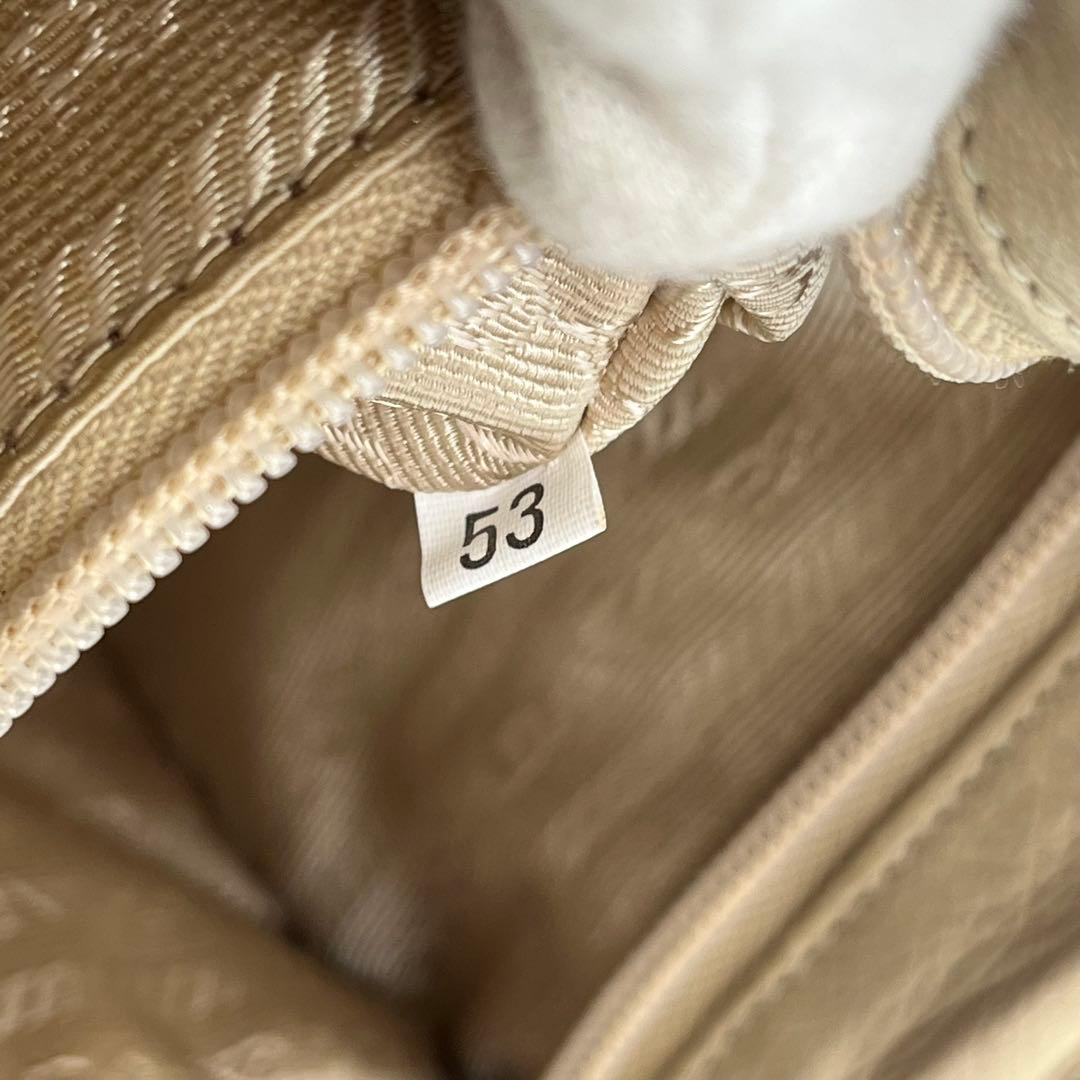 PRADA トートバッグ 肩掛け ロゴ型押し タッセル ナッパレザー ベージュ