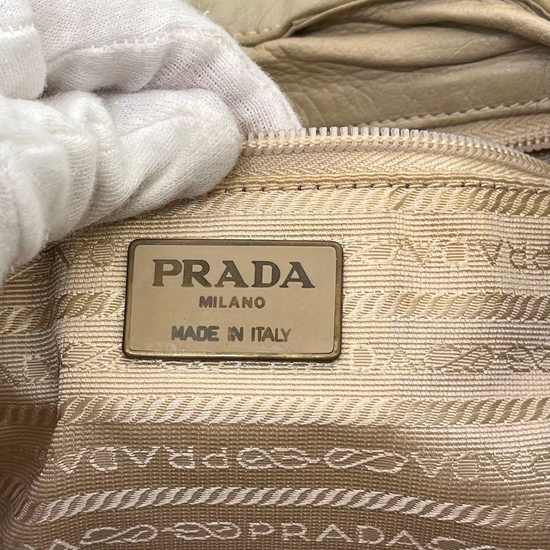 PRADA トートバッグ 肩掛け ロゴ型押し タッセル ナッパレザー ベージュ