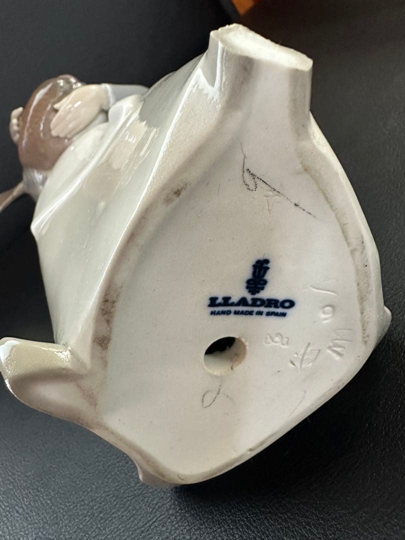 Lladro 七面鳥を抱える女性の置物