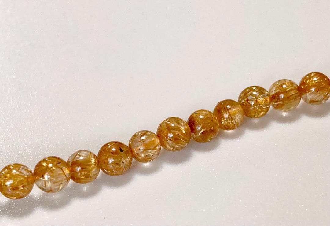 究極品質　超希少幻の逸品　天然石の王者　タイチンルチルキャッツアイの多重編み