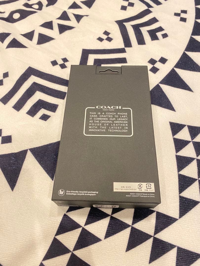 新品COACH iPhone13・14手帳型カバーシグネチャーブラック/値下げ⚠️