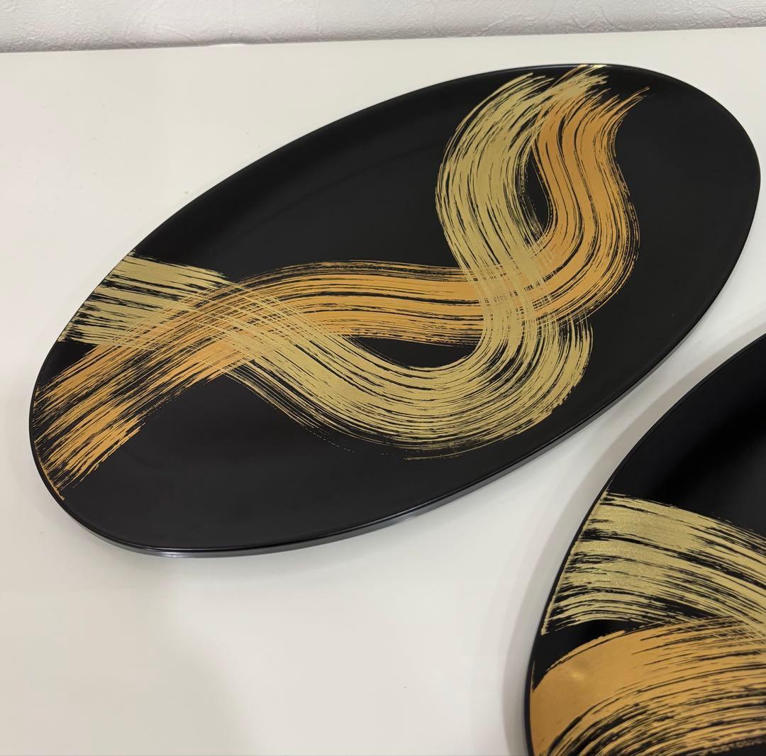 山田平安堂　漆器　オーバルプレート　黒地に金色の装飾皿2枚セット