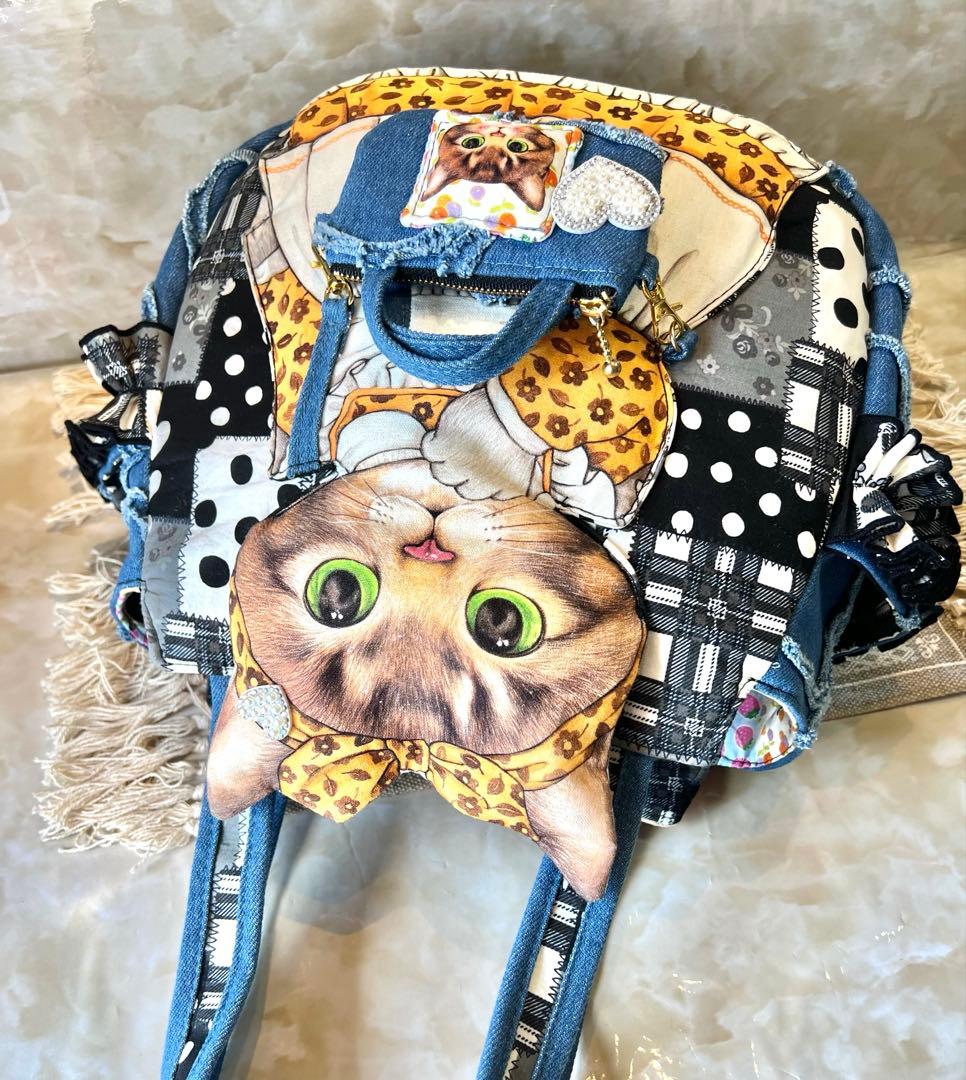 コヤンイサムチョン　ビッグサンダー　フリンジハートサイドポケットデニムバッグ