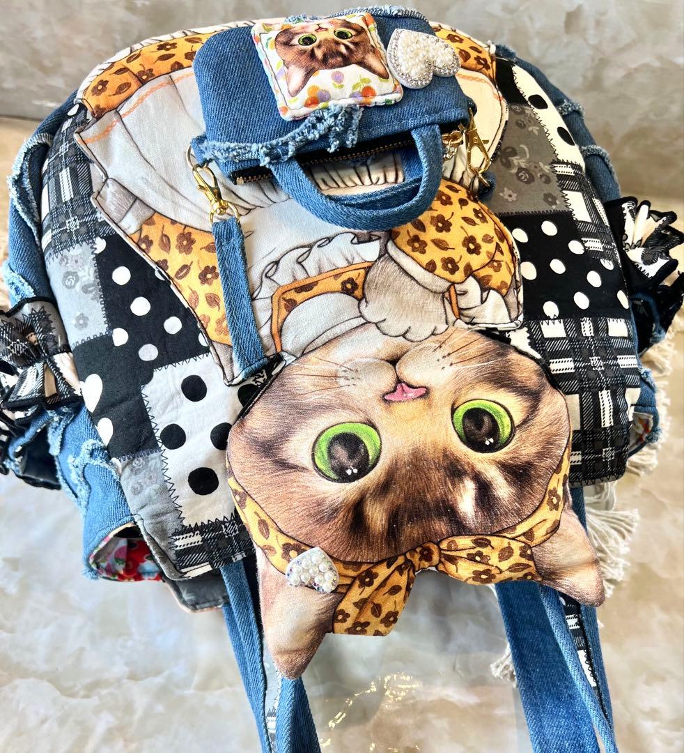 コヤンイサムチョン　ビッグサンダー　フリンジハートサイドポケットデニムバッグ