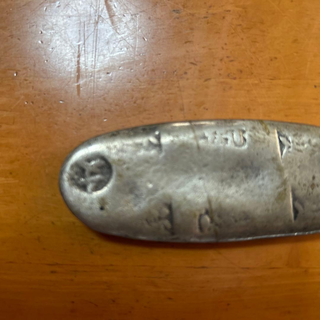 旧貨幣・記念硬貨のような金属製品（丁銀）