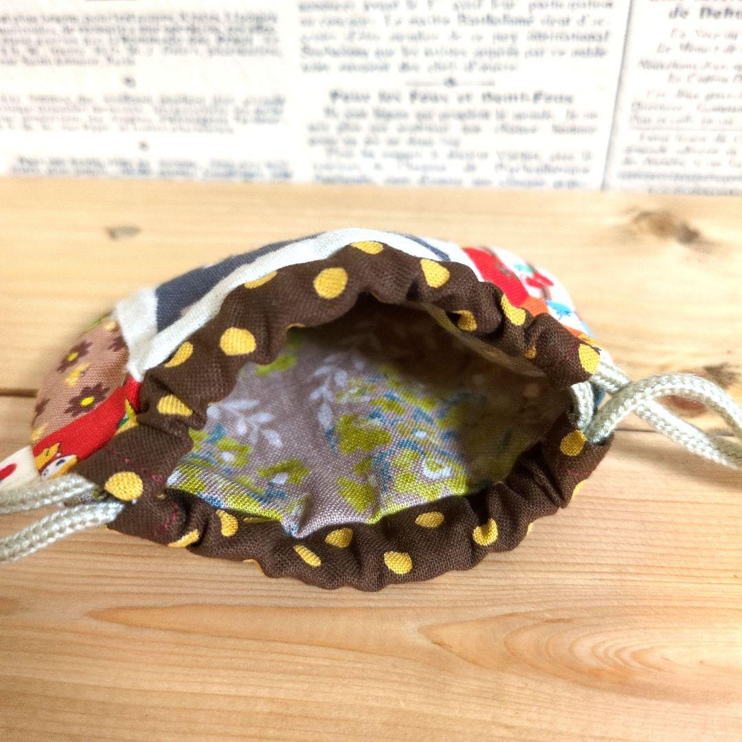 ハンドメイド　まるいミニ巾着 (ネコ　ハニーチューン　花柄)