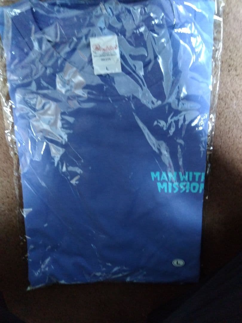 マンウィズアミッション　15th AnnivロゴTシャツ（アシッドブルー）L