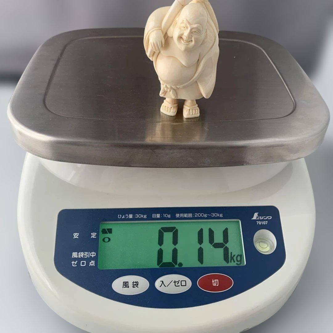 【詳細不明】時代物　置物　瓢箪のようなものを担ぐ男