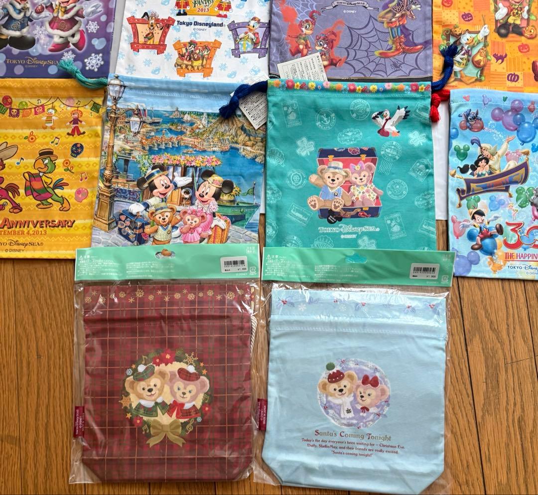 新品タグ付東京ディズニーリゾート巾着14点セット ダッフィーミッキーミニーホテル