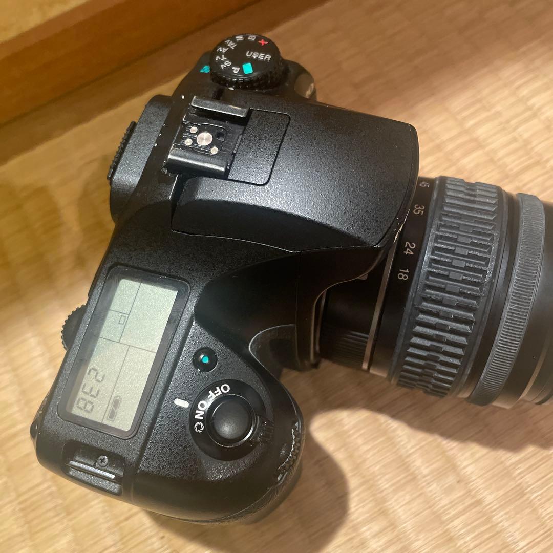 ペンタックス K20W 本体、レンズ1本、バッテリー1個のみ付属。