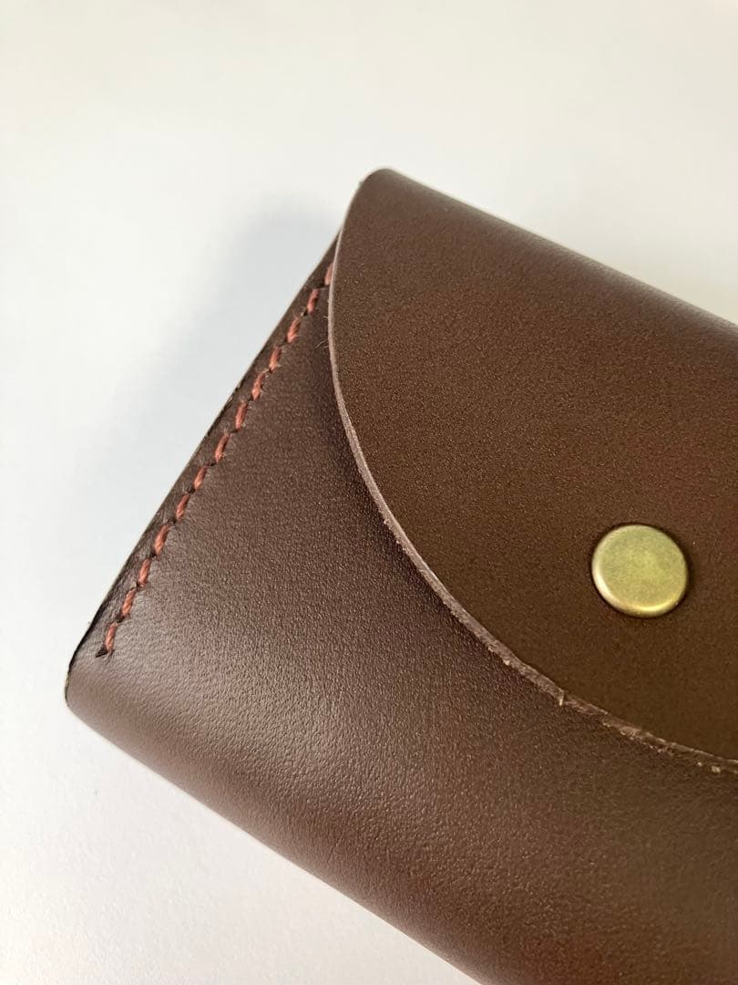 ヌメ革の三つ折り財布[タバコ]