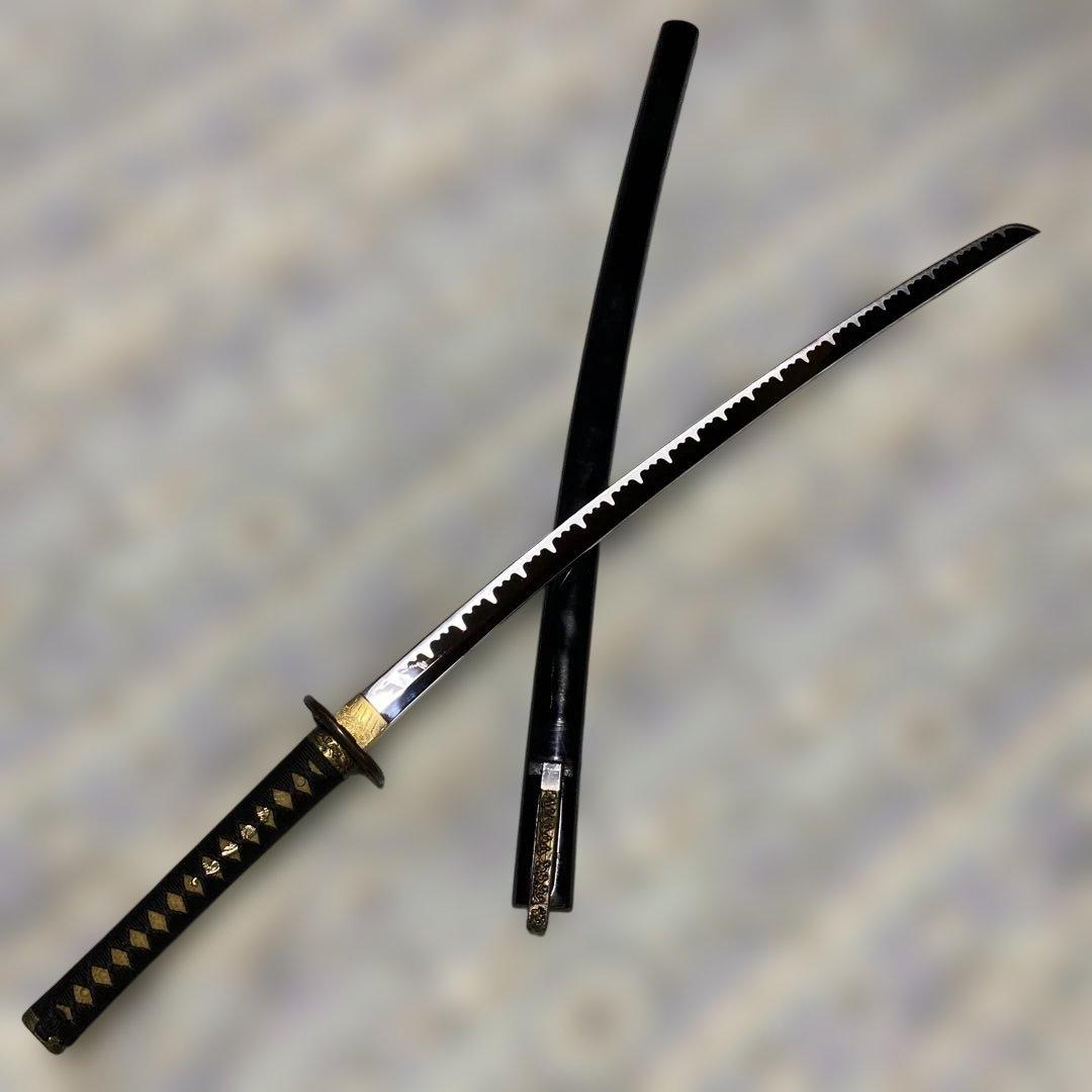 模造刀(小柄付) 黒柄 龍彫楕円鍔 黒呂鞘