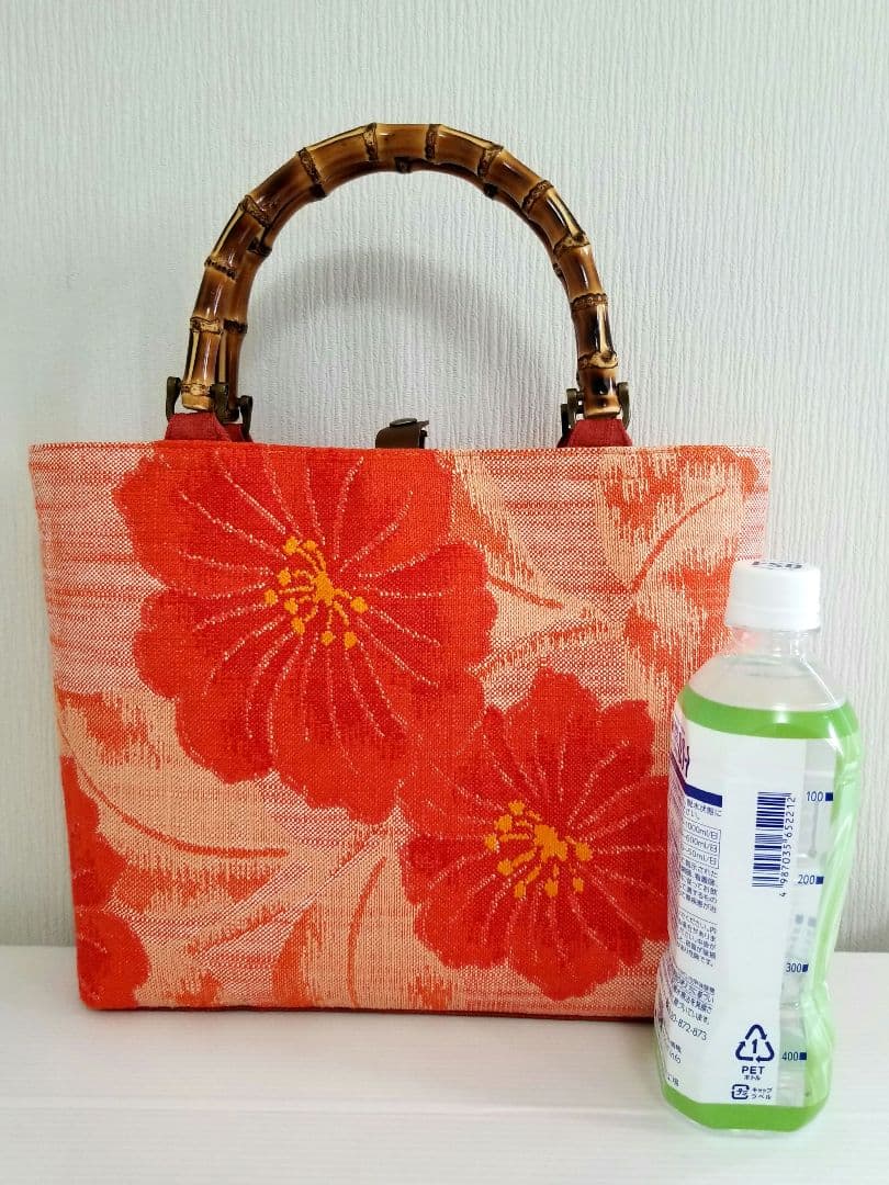 八寸名古屋帯紬　橙色花模様　底しょうざん生紬帯　煉瓦色　リメイク　竹ハンドル