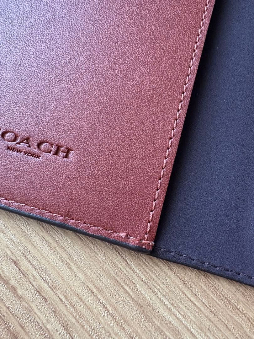 COACH フォリオ・シグネチャーキャンパス手帳型iPhoneケース