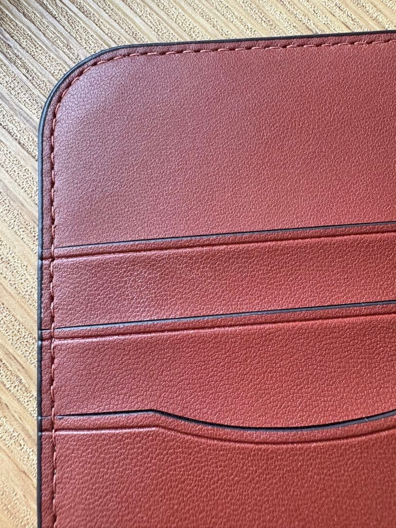 COACH フォリオ・シグネチャーキャンパス手帳型iPhoneケース