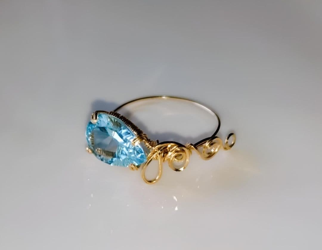 Kgf14 宝石ルース スイスブルートパーズ コンケーブ アラベスク リング