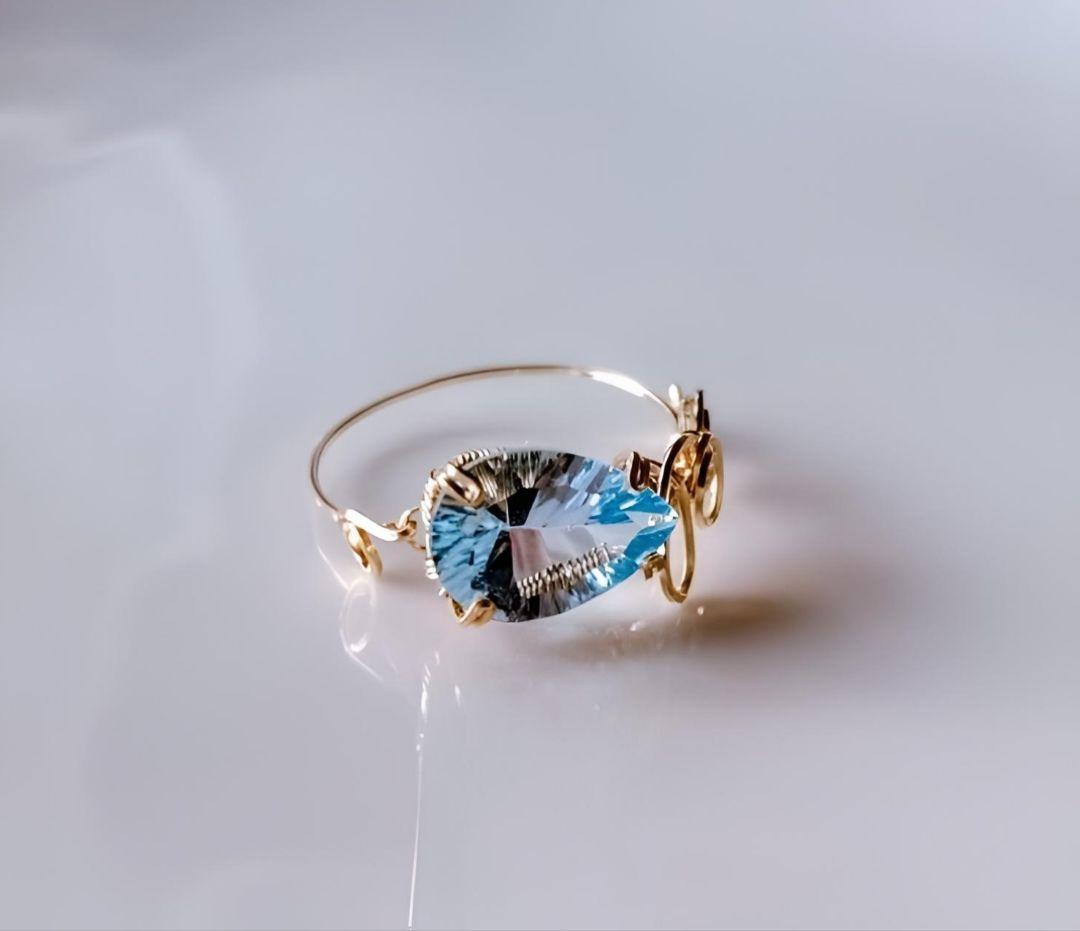 Kgf14 宝石ルース スイスブルートパーズ コンケーブ アラベスク リング