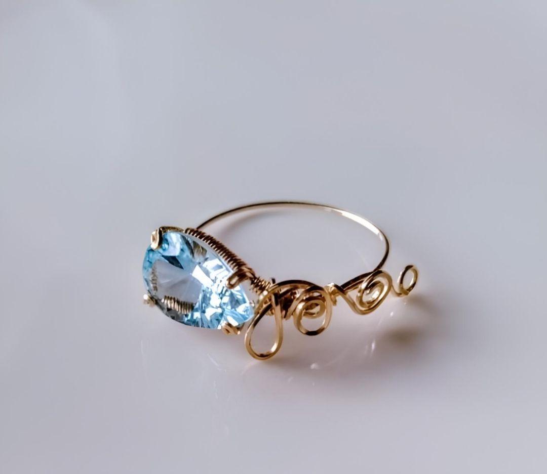 Kgf14 宝石ルース スイスブルートパーズ コンケーブ アラベスク リング