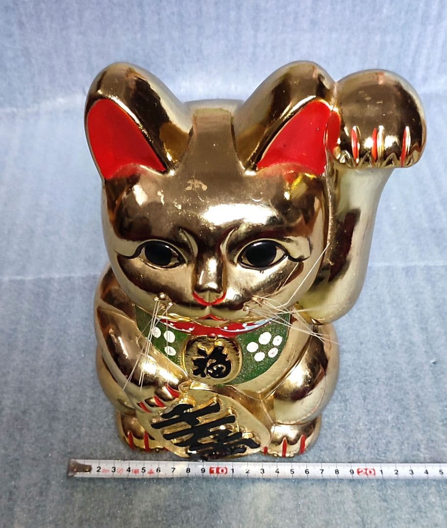 金色　招き猫　貯金箱　左手　高さ約27cm　横幅約16cm　厚さ約13cm