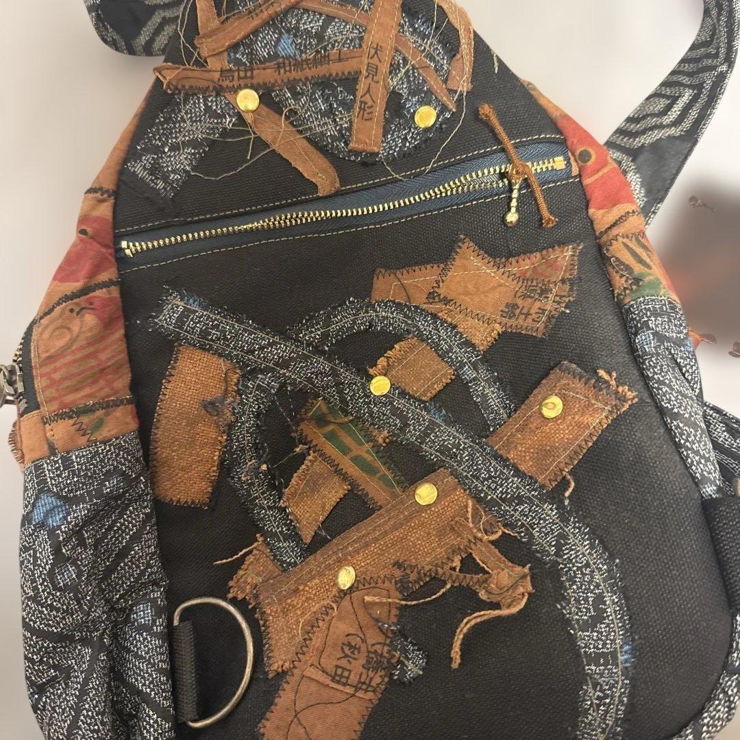 ハンドメイド作品　ショルダーバッグ　縁起物柿渋絣紬古布木札チャーム付き