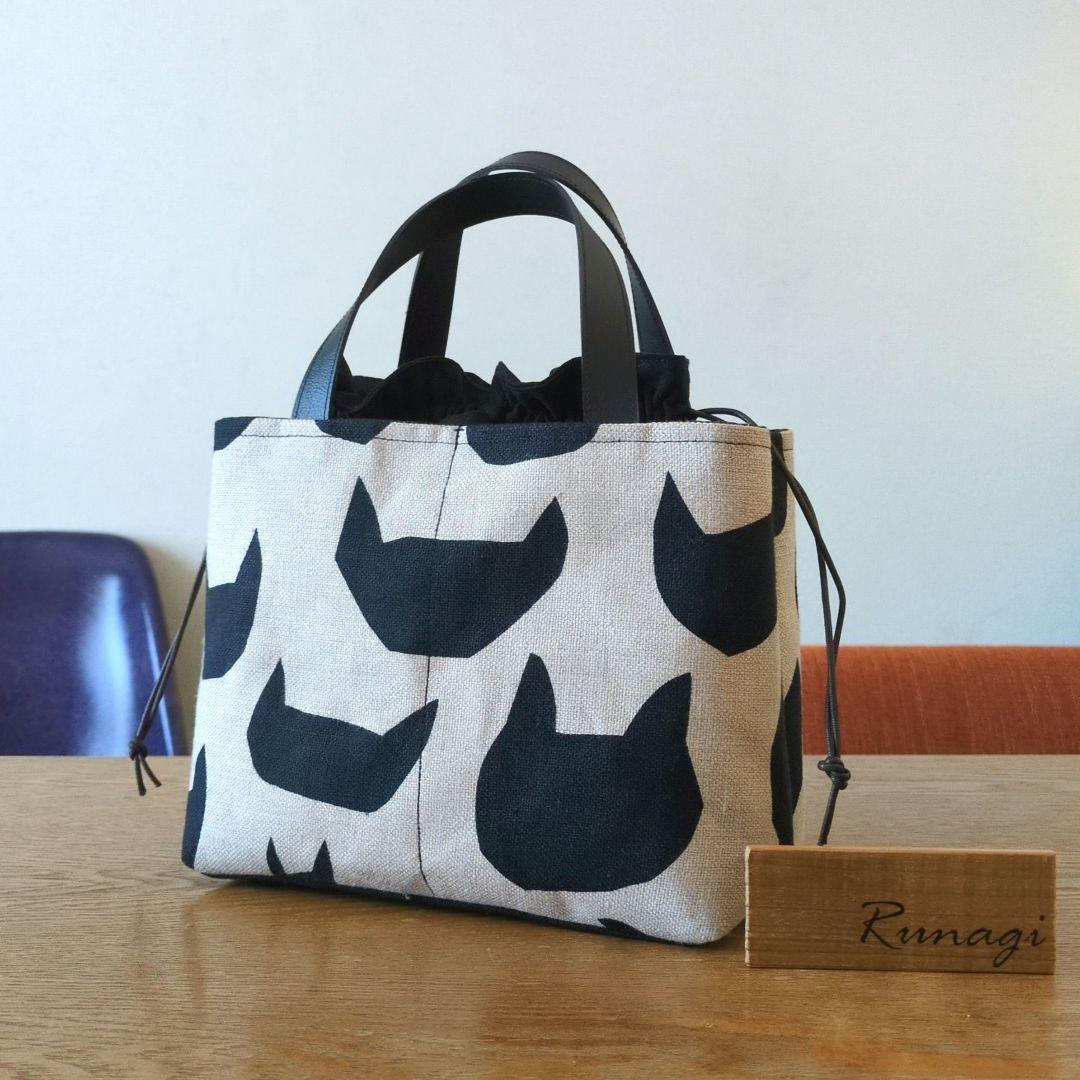 あおりポケットの巾着バッグ＊ミナペルホネン anoneanone