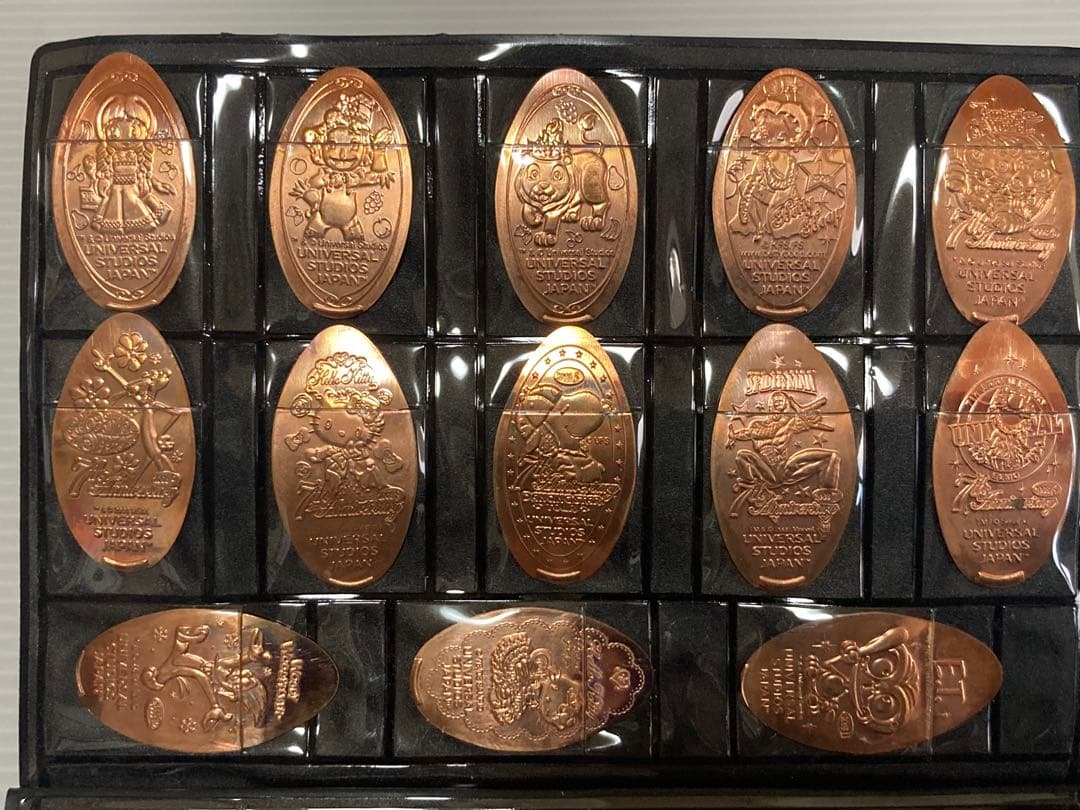 USJメダリオンコレクションホルダー&メダル78枚 ユニバーサルスタジオジャパン