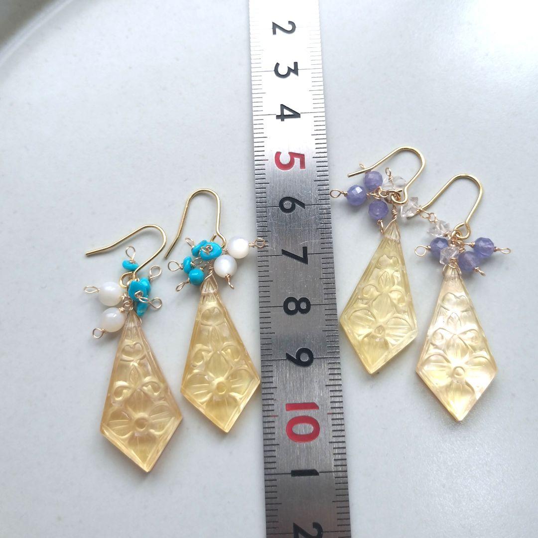 【A】イエローシェルと水晶のカービングとスリーピングビューティターコイズピアス
