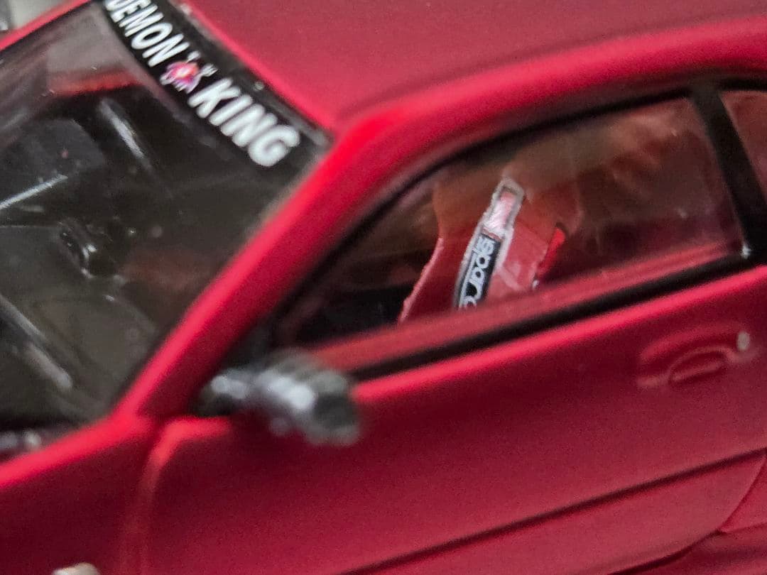 限定700台1/64車魔王AUTOEXPO2025日産スカイラインGT-R34赤