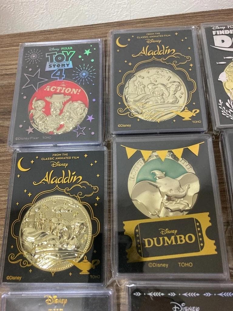 Disney ディズニー　ピクサー　映画記念メダル　14個セット　グッズ