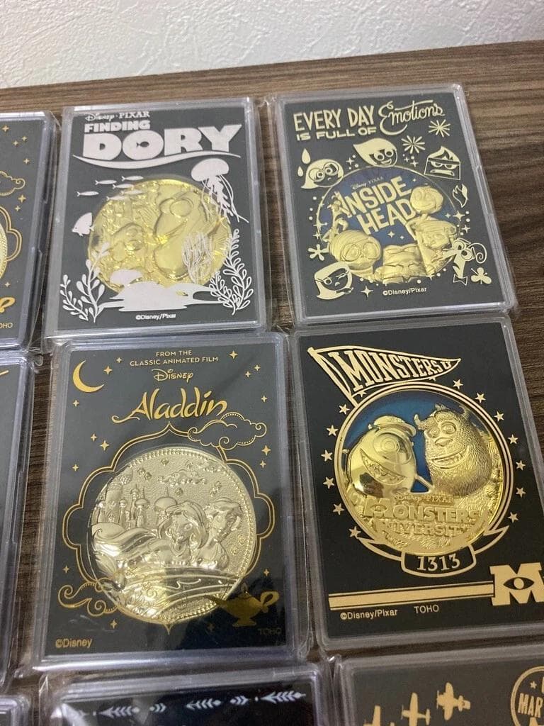 Disney ディズニー　ピクサー　映画記念メダル　14個セット　グッズ