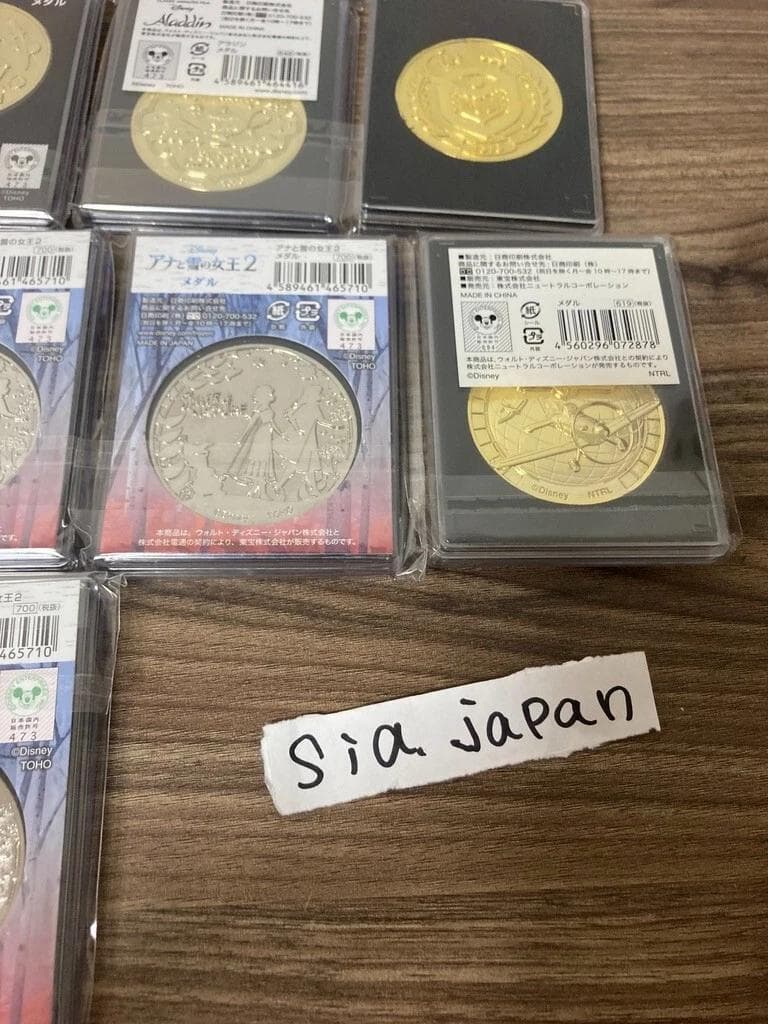 Disney ディズニー　ピクサー　映画記念メダル　14個セット　グッズ