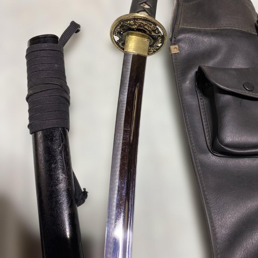 居合刀(刀ケース付) 黒柄 龍彫透し丸鍔 黒梨地鞘