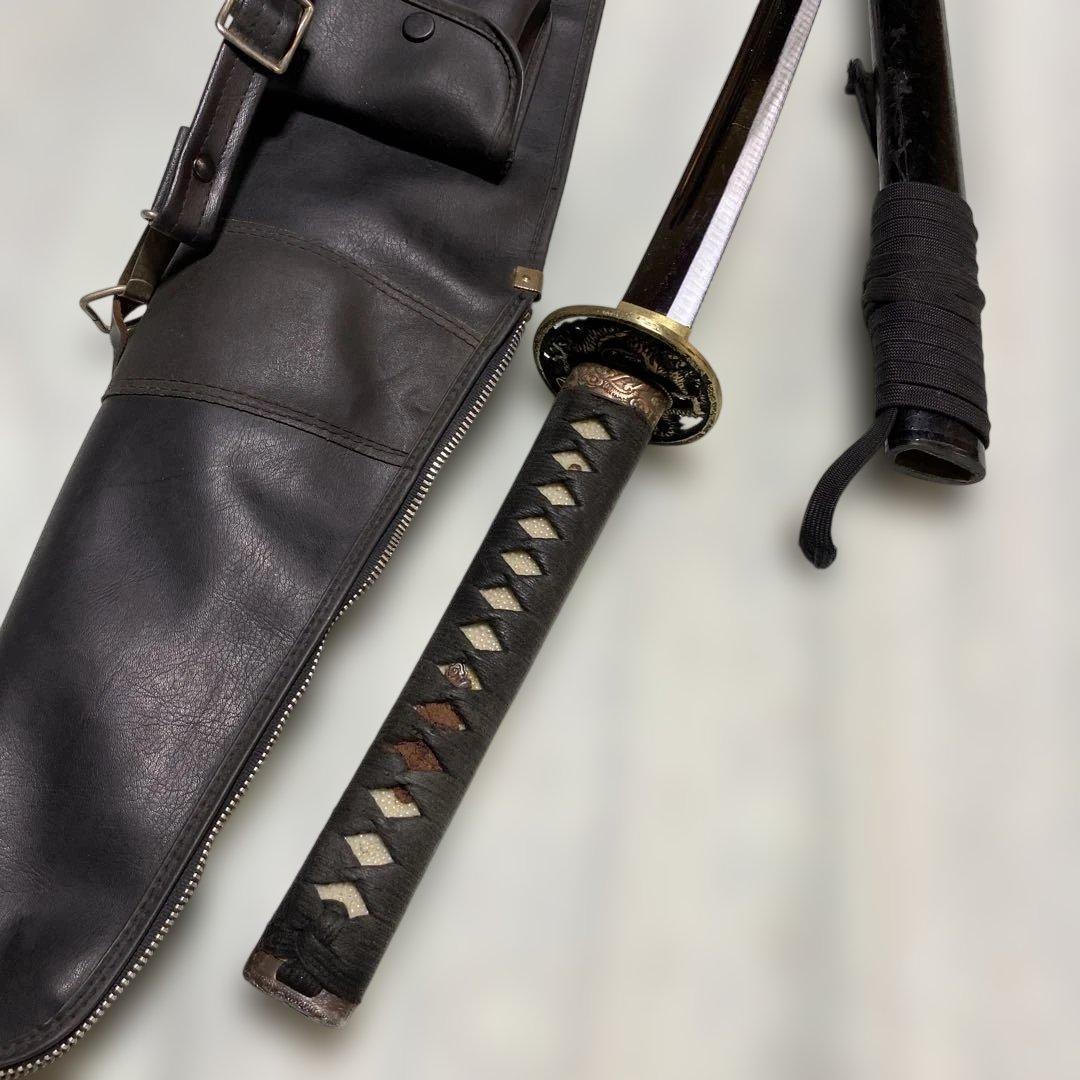 居合刀(刀ケース付) 黒柄 龍彫透し丸鍔 黒梨地鞘