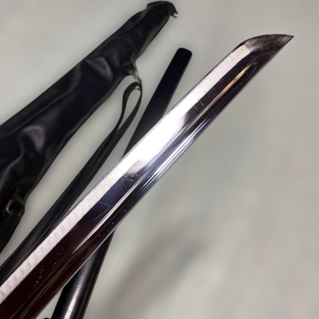 居合刀(刀ケース付) 黒柄 龍彫透し丸鍔 黒梨地鞘