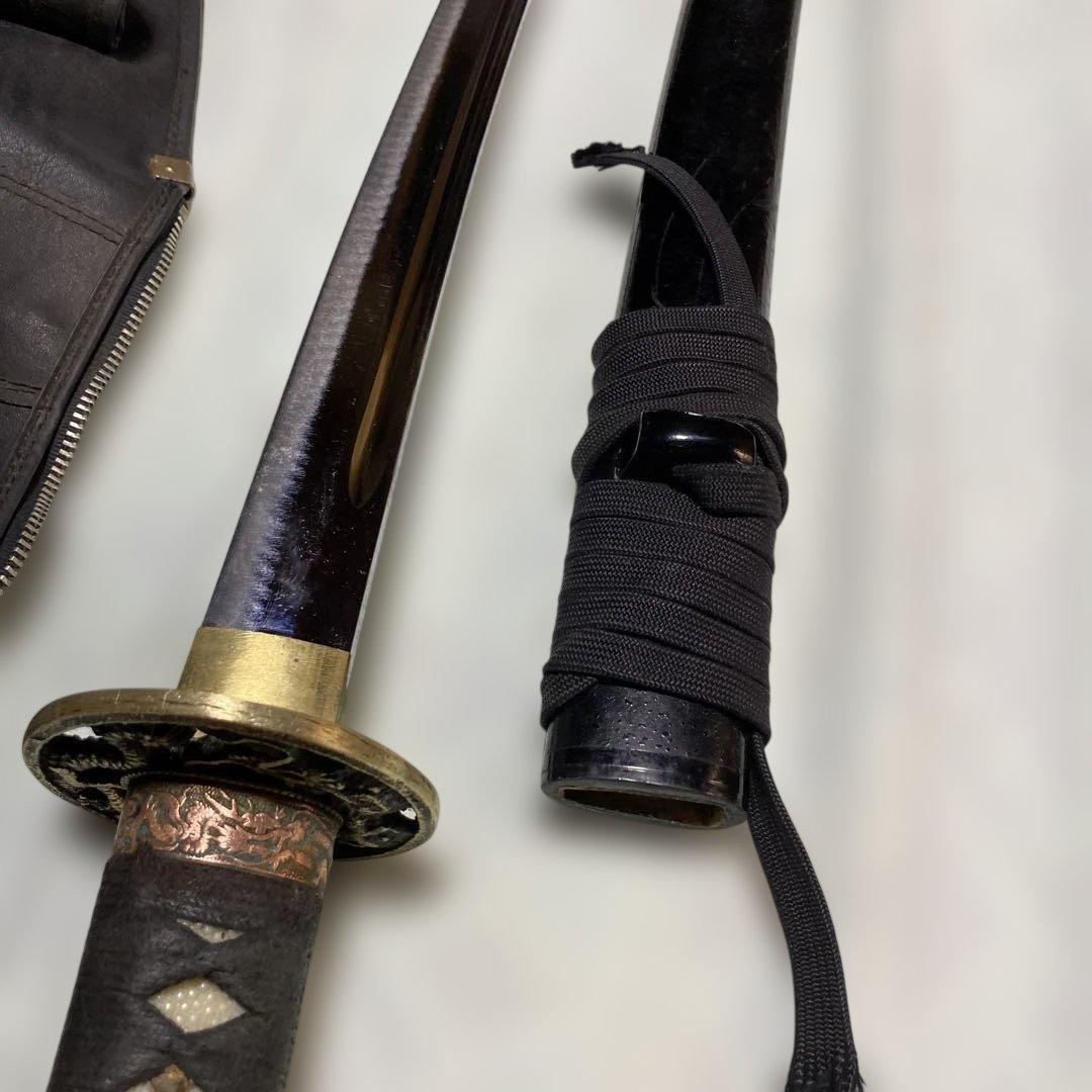 居合刀(刀ケース付) 黒柄 龍彫透し丸鍔 黒梨地鞘