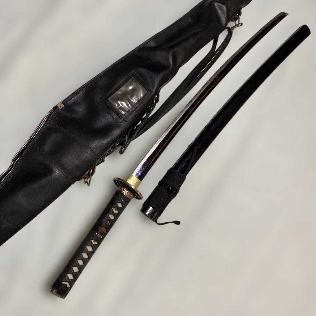 居合刀(刀ケース付) 黒柄 龍彫透し丸鍔 黒梨地鞘