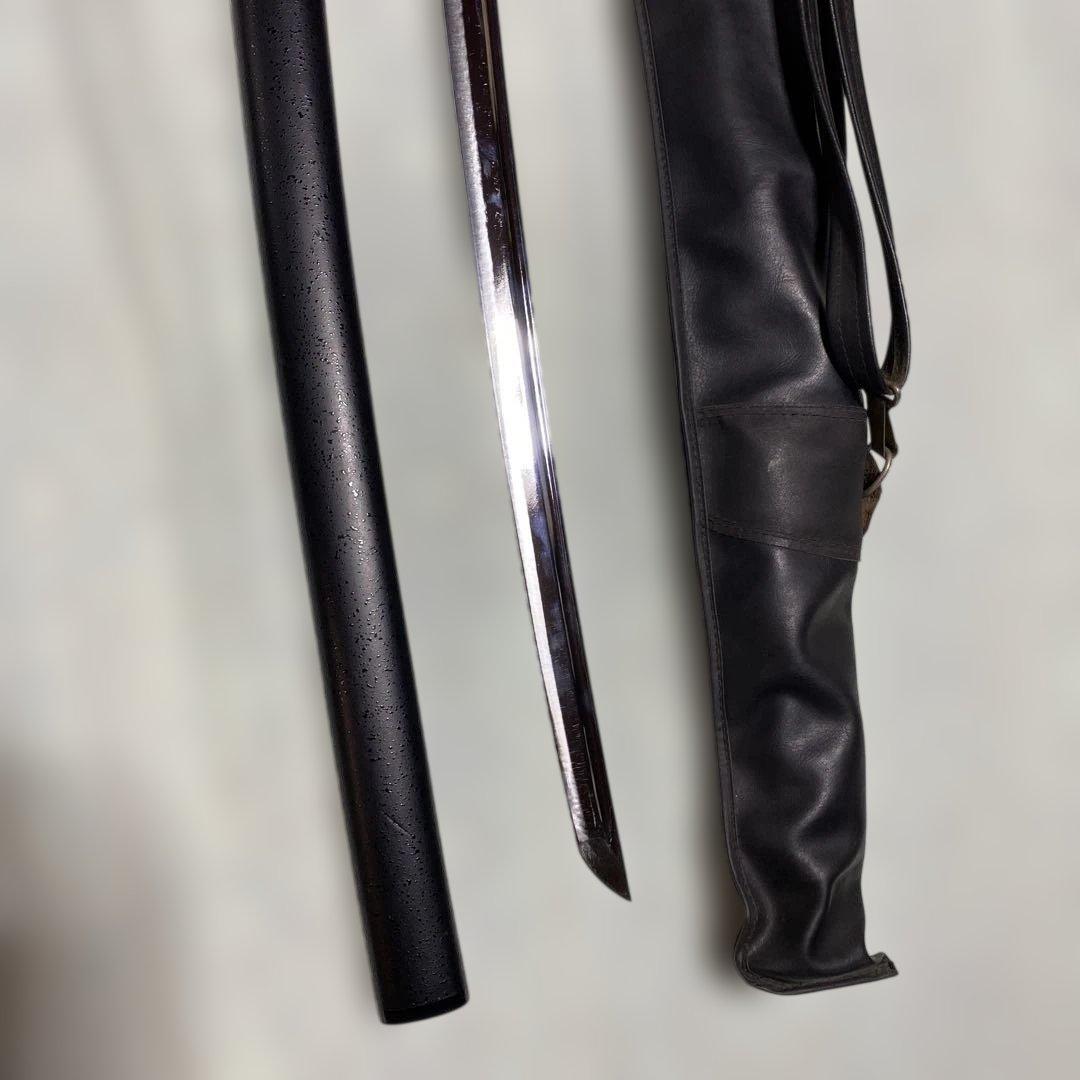 居合刀(刀ケース付) 黒柄 龍彫透し丸鍔 黒梨地鞘