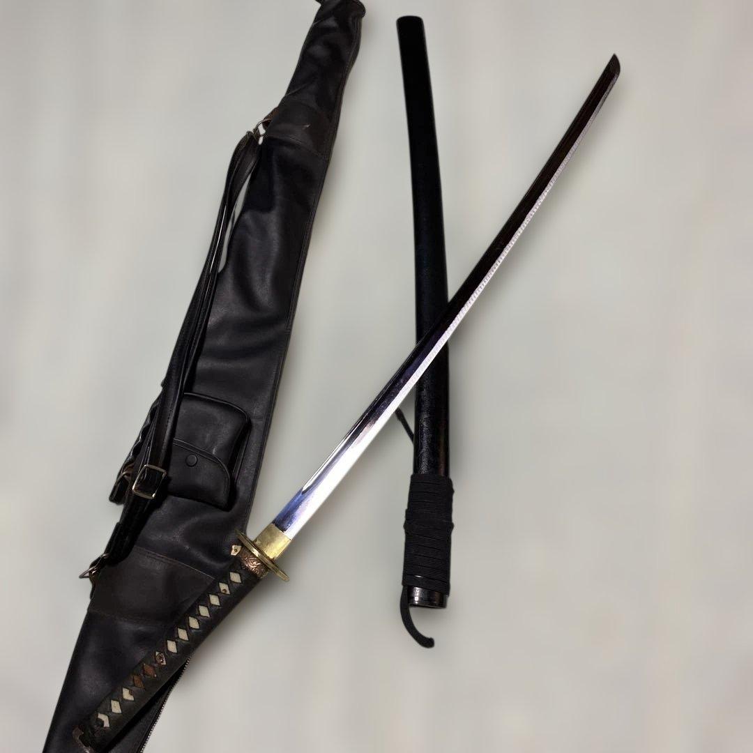 居合刀(刀ケース付) 黒柄 龍彫透し丸鍔 黒梨地鞘