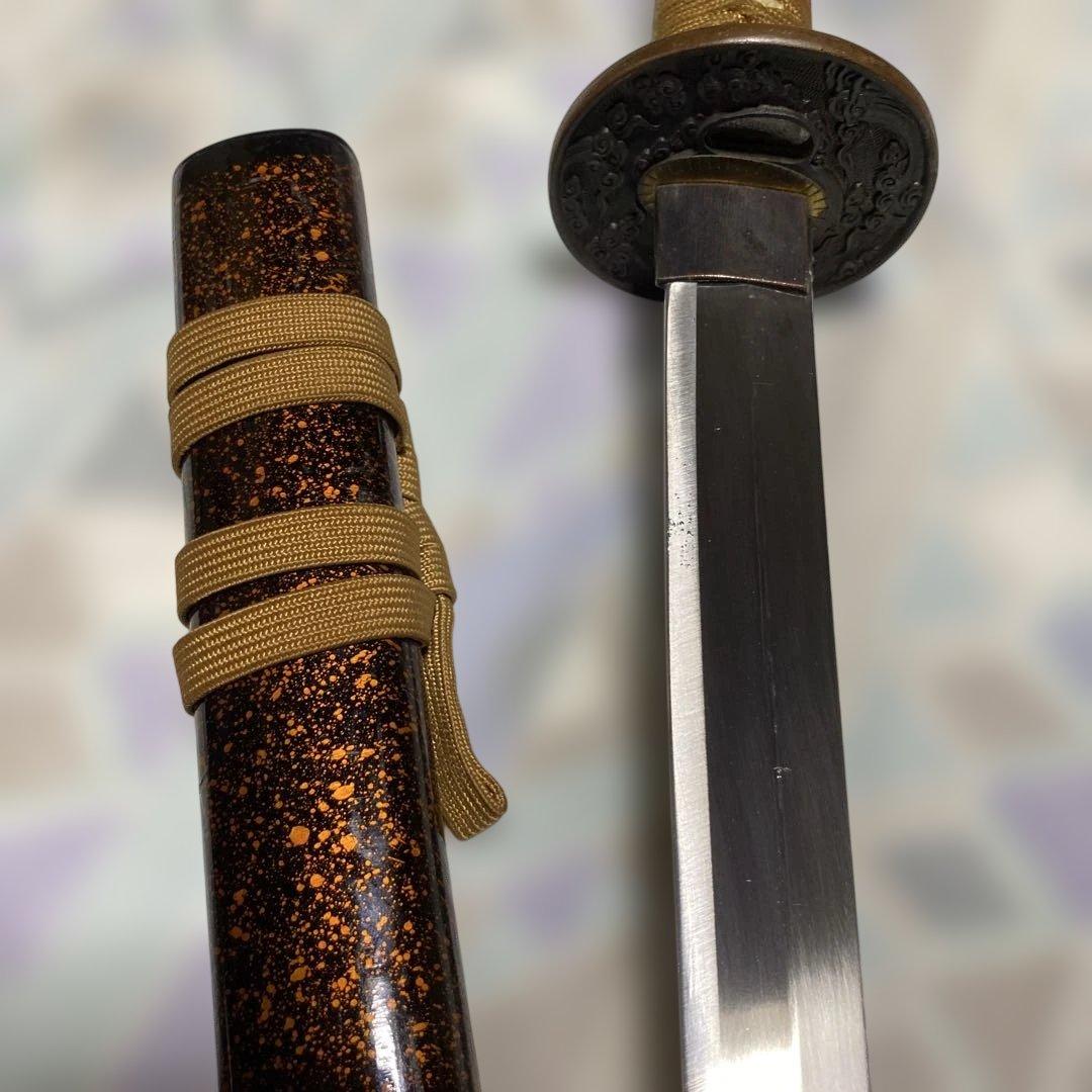 模造大刀 金茶柄 雲龍楕円鍔 黒粒梨地呂鞘