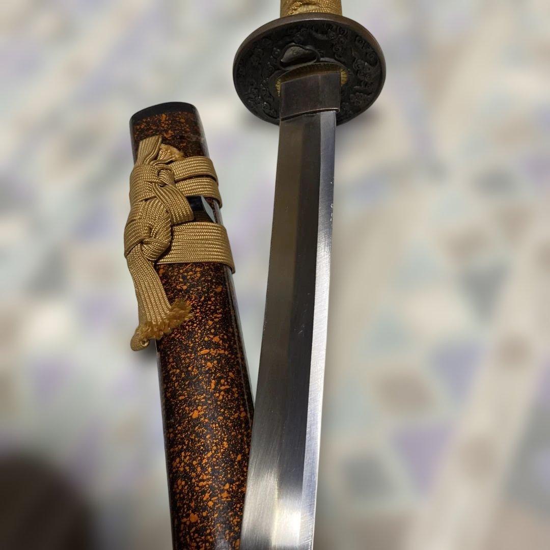 模造大刀 金茶柄 雲龍楕円鍔 黒粒梨地呂鞘