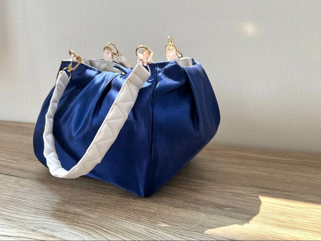 コロンとまるい 薄桃色のリバーシブルバッグ 帯リメイクバッグ 着物 和装バッグ