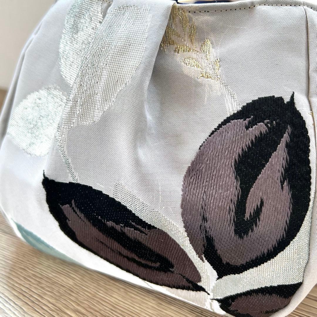 コロンとまるい 薄桃色のリバーシブルバッグ 帯リメイクバッグ 着物 和装バッグ