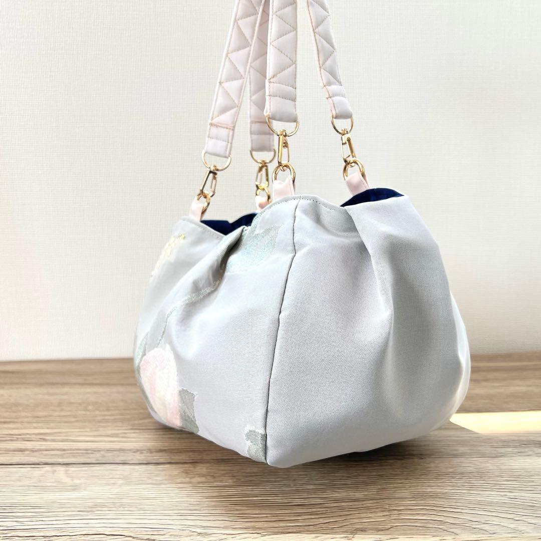 コロンとまるい 薄桃色のリバーシブルバッグ 帯リメイクバッグ 着物 和装バッグ