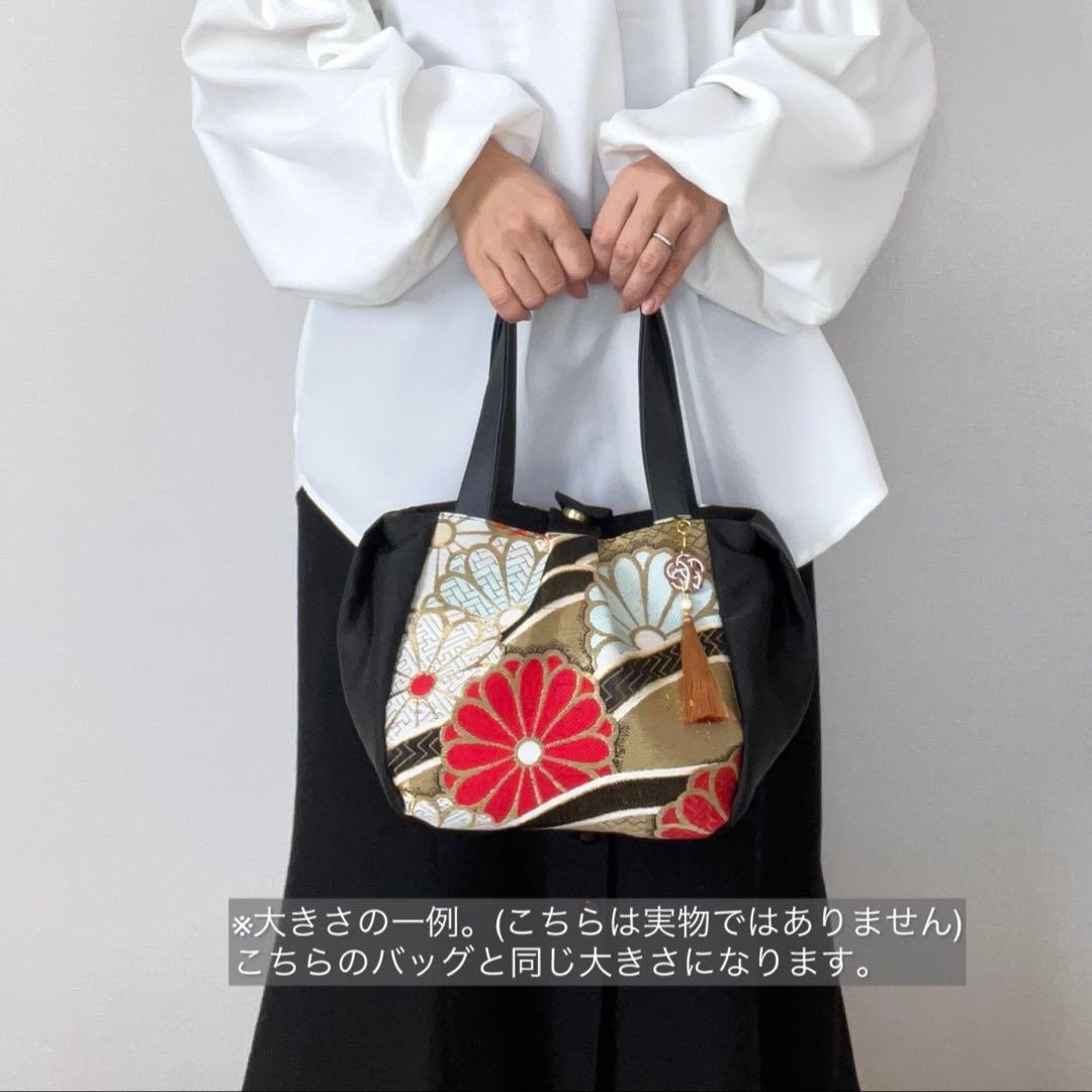 コロンとまるい 薄桃色のリバーシブルバッグ 帯リメイクバッグ 着物 和装バッグ