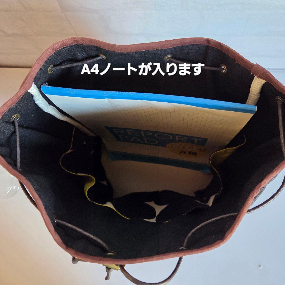 あんぱん柄と撥水キルトの巾着リュック(A4サイズ)　ブラック×ブラウン