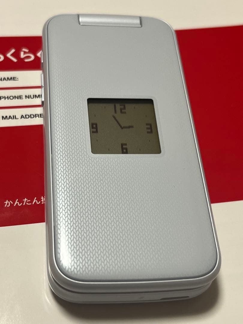 ドコモ　らくらくホン　F-01M　4G対応　純正ホルダー付　アダプター付き
