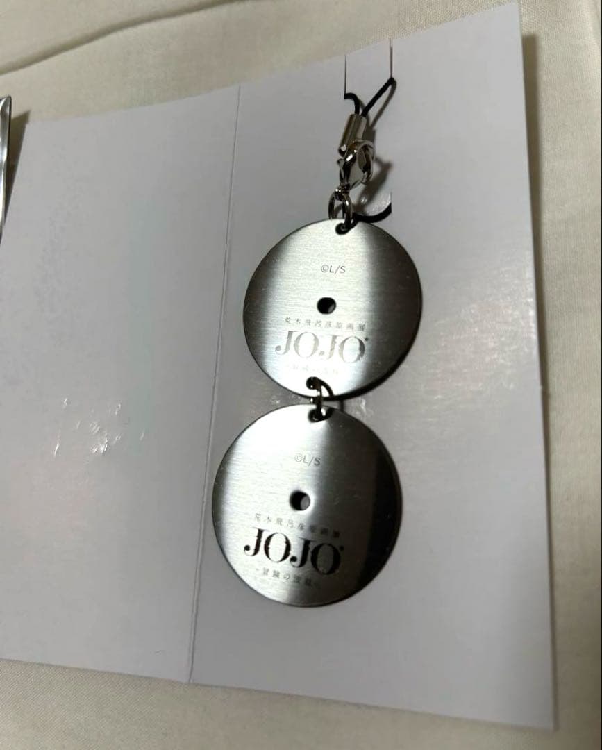 ジョジョ展 メタルDISC型 キーホルダー 限定品 荒木飛呂彦 原画展 空条徐倫
